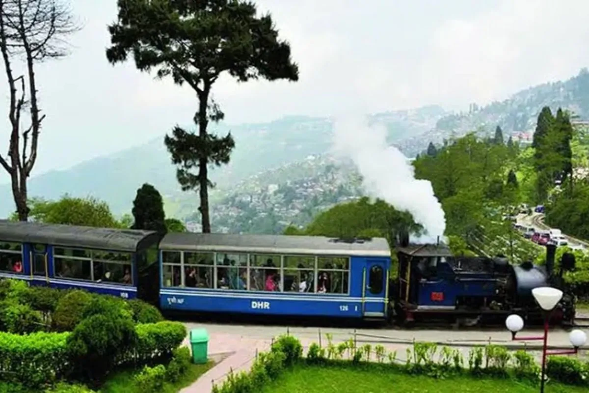 Places to visit in Darjeeling – a steam locomotive of the Darjeeling Himalayan Railway on the hill line