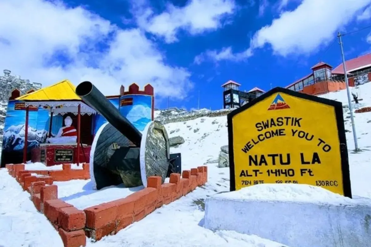 Sikkim travel information – the Nathu La signboard standing in snow at the pass