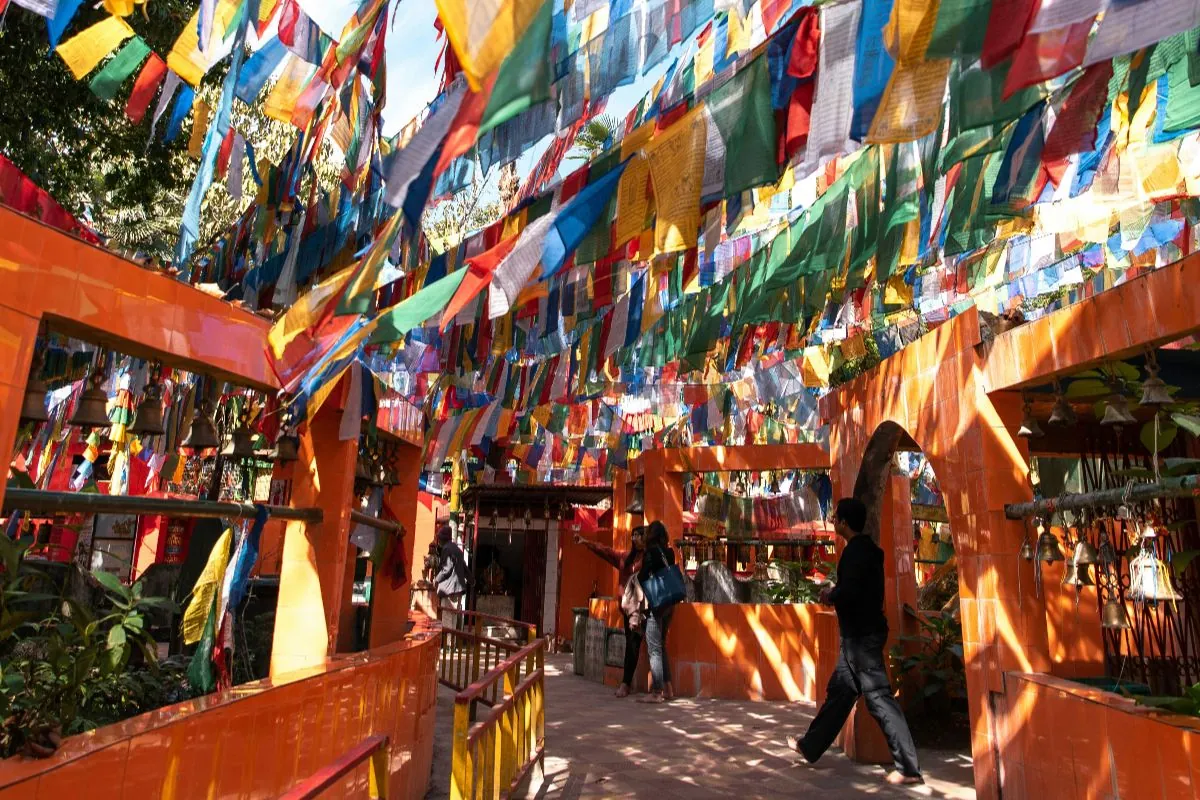 Plan your Sikkim trip &ndash; prayer flags against a bright Himalayan sky